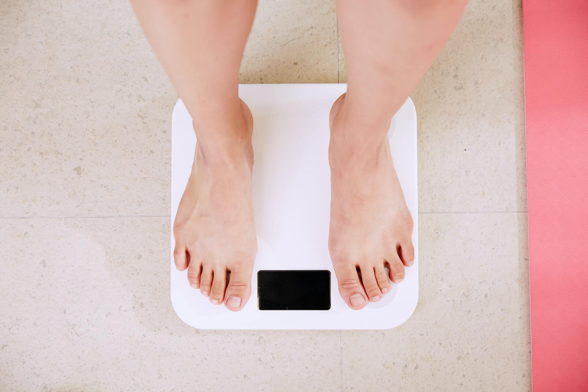 a person on a weighing scale