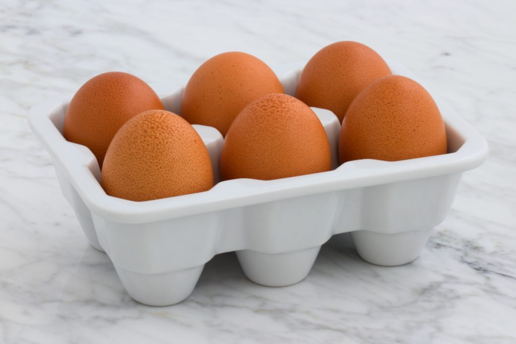 six eggs on an egg tray